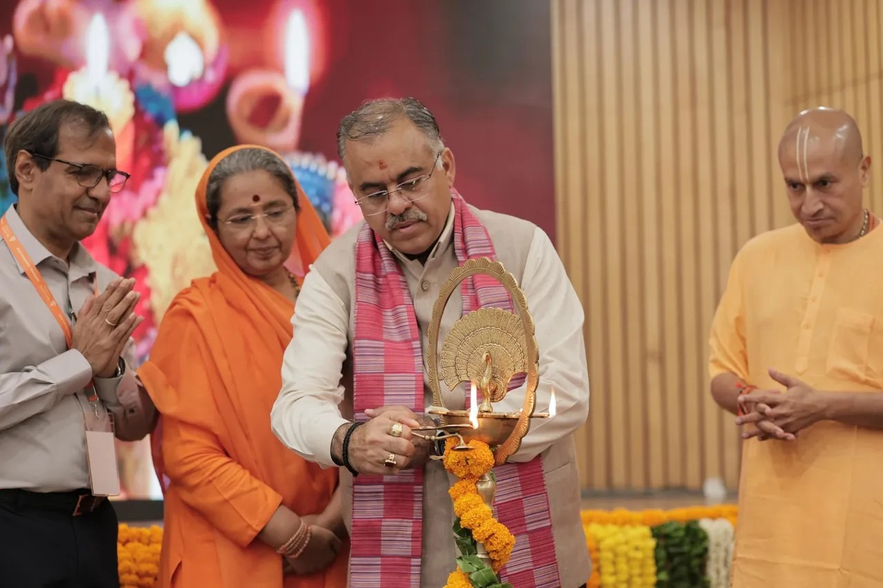 Guest of Honor Tarun Chugh, National General Secretary of the BJP, inaugurating the National Conference on Spirituality in Schools along with Gauranga Das Prabhu (right) and Swamini Pramananda.